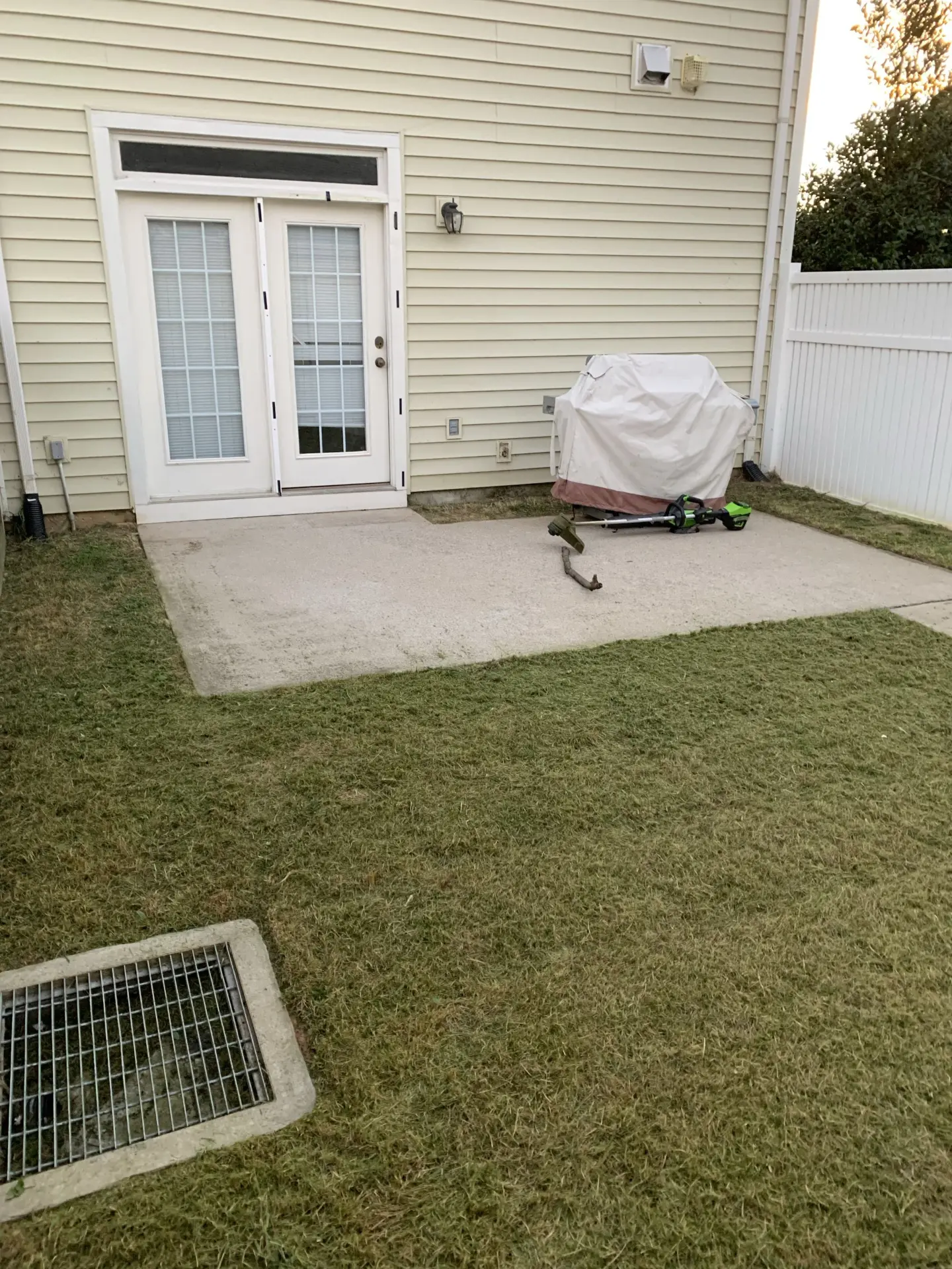 Example qualifying backyard with a small lawn and patio